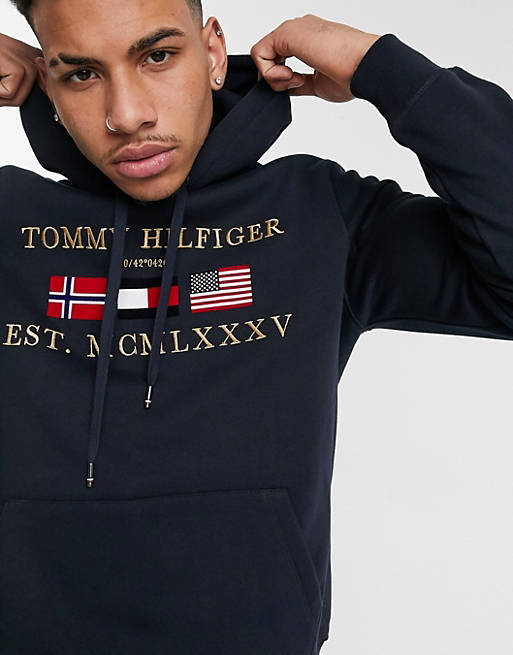 Tommy Hilfiger multi flag logo hoodie in navy | ASOS