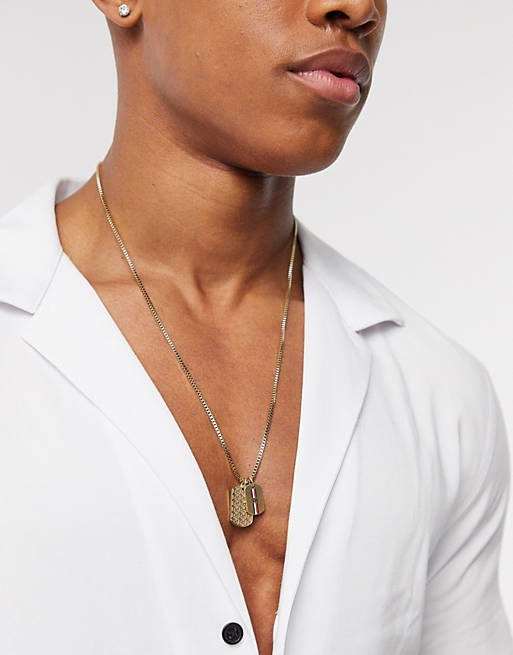 To disable Evacuation Vinegar Tommy Hilfiger neckchain in gold with double dog tag pendants | ASOS