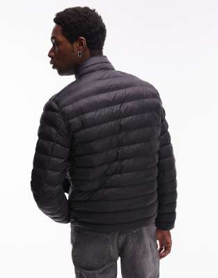 Shop Tommy Hilfiger Padded Jacket In Black