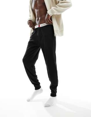 Tommy Hilfiger lounge logo waistband jogger in black - ASOS Price Checker