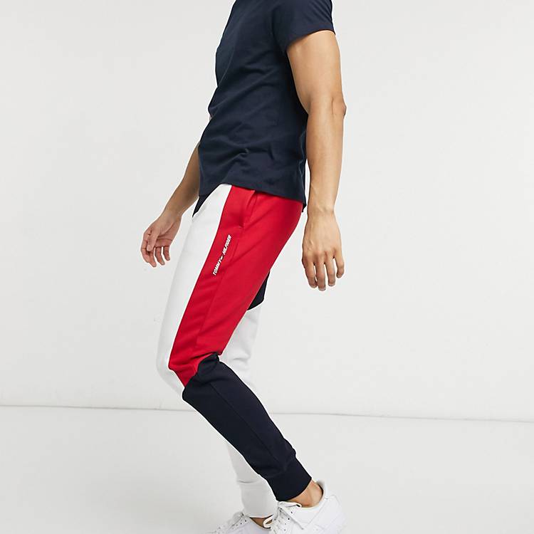 Tommy Hilfiger Performance color block flag cuffed sweatpants in desert sky  navy | Gp17Shops | Sac à main TOMMY JEANS Tjw Retro Basket AW0AW12416 THW