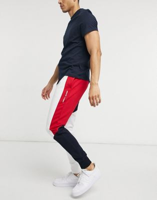 Tommy Hilfiger Performance colour block flag cuffed joggers in desert sky navy
