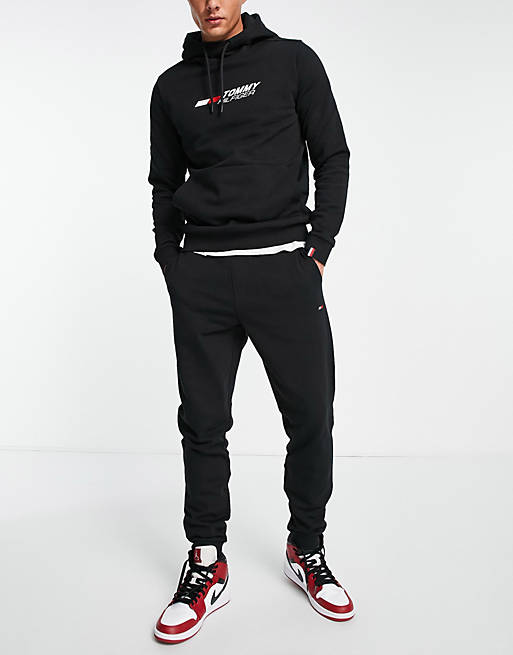 Tommy Hilfiger Performance essentials logo cuffed sweatpants in black | ASOS