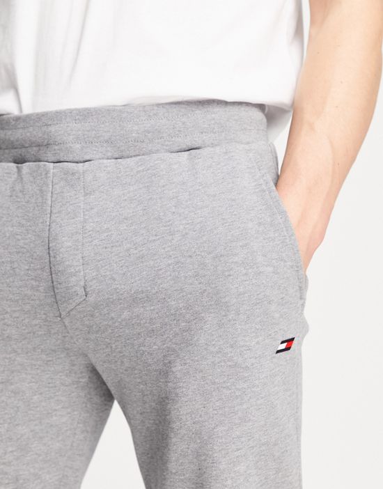 https://images.asos-media.com/products/tommy-hilfiger-performance-essentials-logo-cuffed-sweatpants-in-gray-heather/202454720-4?$n_550w$&wid=550&fit=constrain