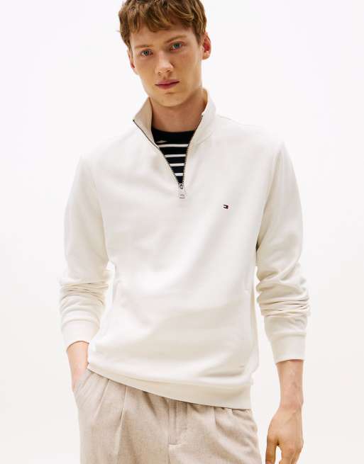 Tommy Hilfiger – Performance – Pullover aus Intechno-Strick in Beige mit kurzem Reißverschluss