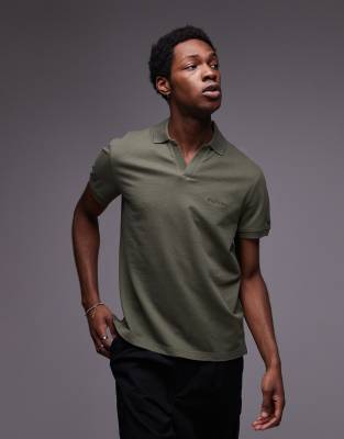 Tommy Hilfiger - Polo avec col ouvert et logo ton sur ton - Vert olive