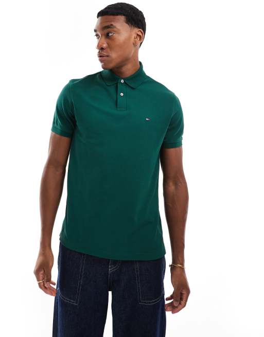 Tommy Hilfiger – Polohemd in Grünblau mit normalem Schnitt und Flaggenstickerei