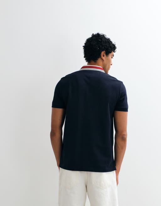 Tommy Hilfiger – Polohemd in Marineblau mit Logo-Grafikprint auf der Brust, 5 von 5