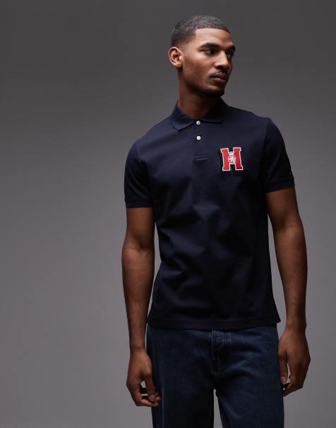 Tommy Hilfiger - Poloshirt met geborduurd grafisch logo op de borst in marineblauw - view 1