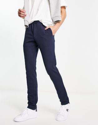 Tommy Hilfiger pull on Bleecker chino pants in desert sky navy - ASOS Price Checker