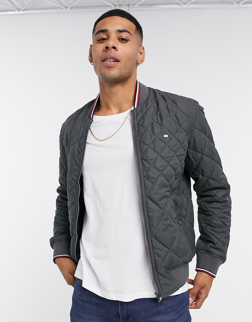 Tommy Hilfiger reversible flag logo quilted bomber jacket in grey/navy