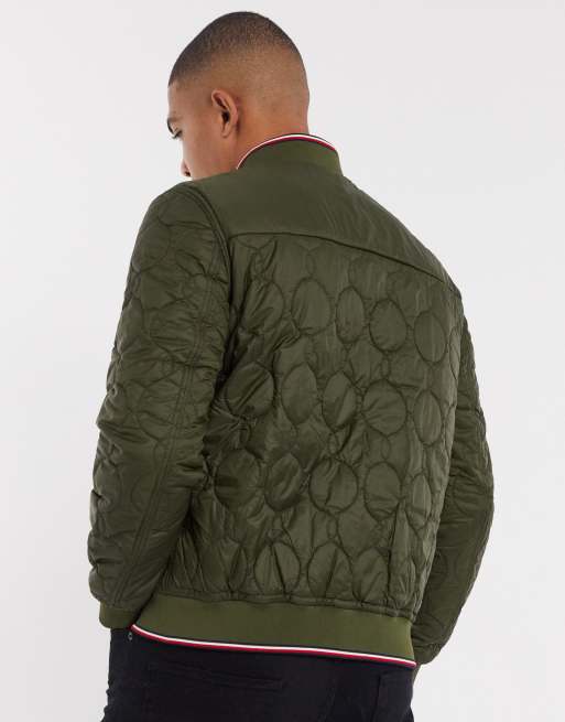 ASOS DESIGN reversible quilted bomber jacket in khaki and cream