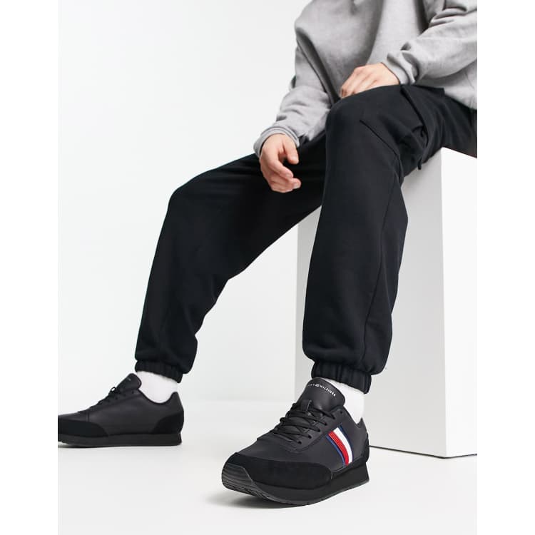 Tommy Hilfiger runner in black with flag stripe detail | ASOS