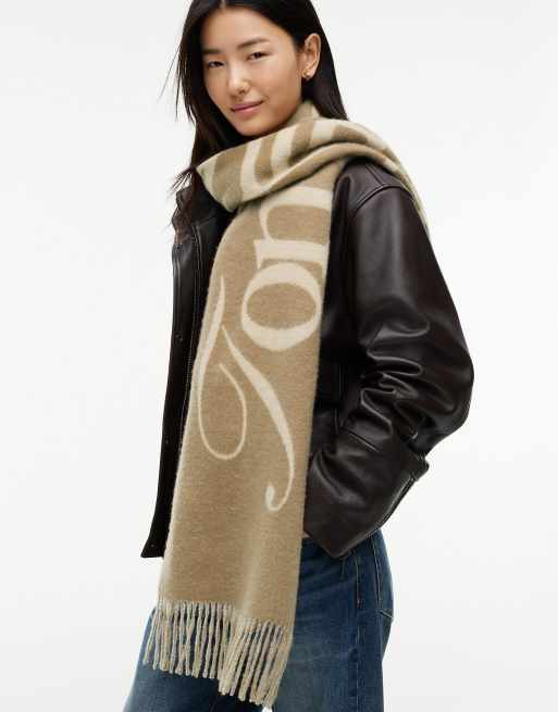 Tommy Hilfiger Schal aus reiner Wolle mit gewebtem Logo in Beige, 4 von 4
