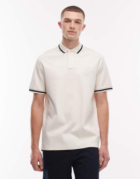 Tommy Hilfiger script logo polo shirt in cream - view 1