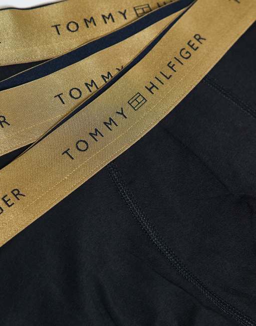 Tommy Hilfiger signature cotton essentials 3 pack trunks in black with gold waistbands, 2 of 3