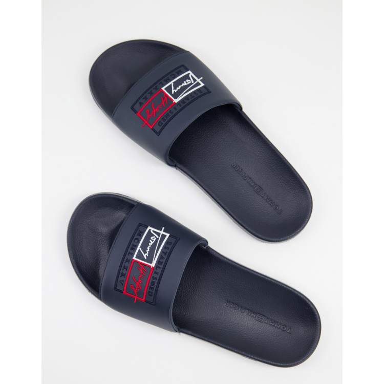 Tommy Hilfiger slides with script logo in navy