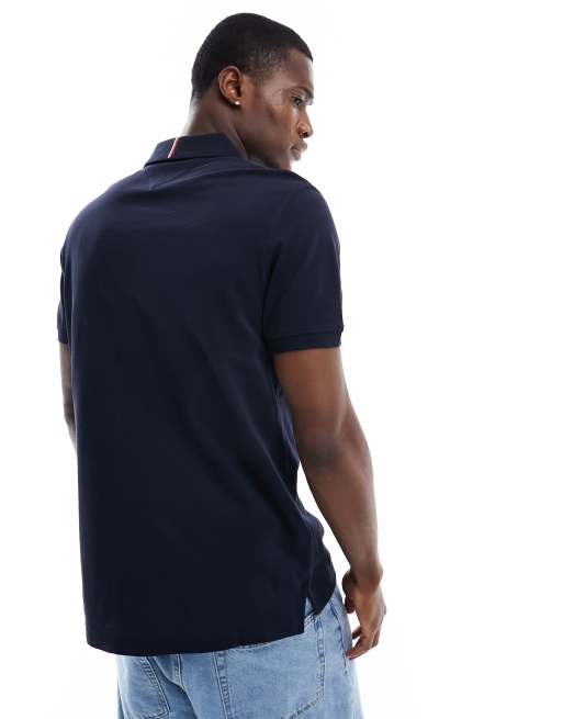 Tommy Hilfiger striped chest regular polo in navy ASOS