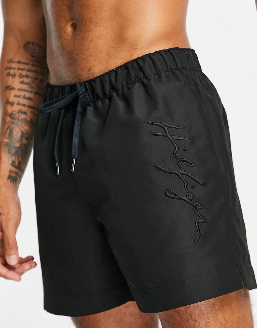 Tommy Hilfiger swim shorts with side script logo in black
