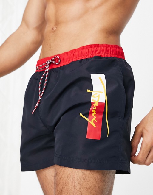 Tommy Hilfiger swim shorts with side script logo in navy