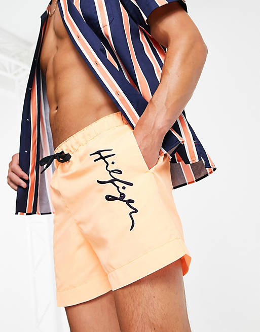 Tommy Hilfiger swim shorts with side script logo in orange