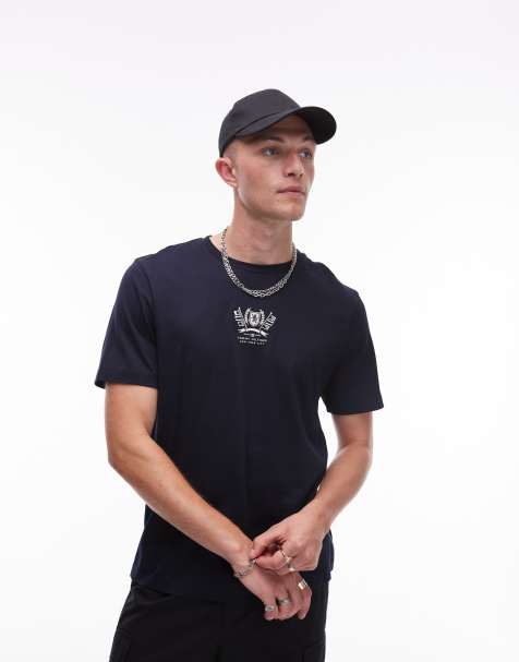 Tommy Hilfiger – T-Shirt in Marineblau mit gesticktem Wappen-Logo - view 1