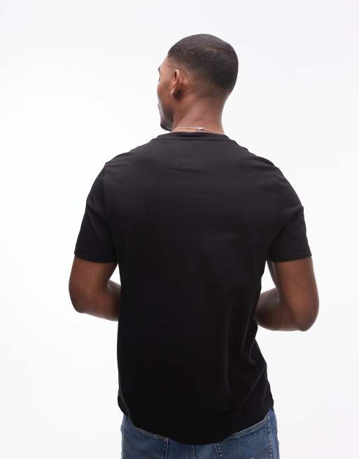 Tommy Hilfiger – T-Shirt in Schwarz mit Stapel-Logo, 4 von 4
