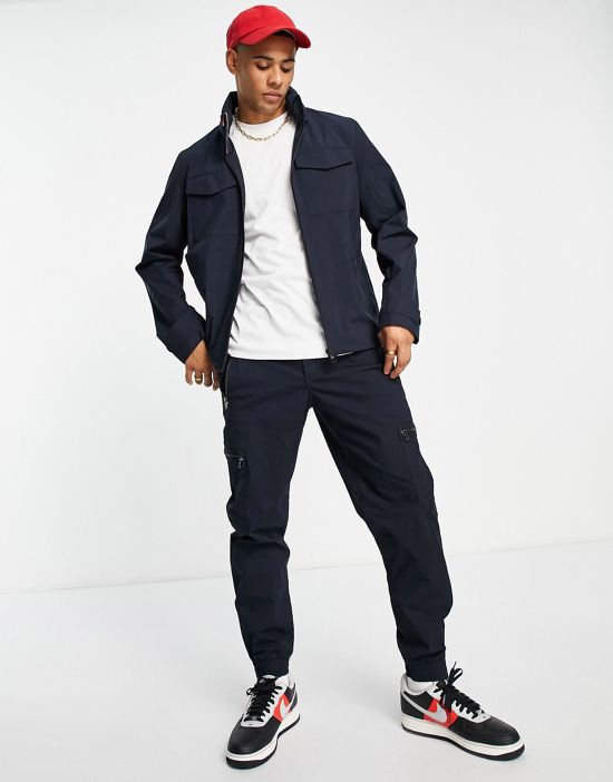 https://images.asos-media.com/products/tommy-hilfiger-tech-stand-collar-harrington-jacket-in-navy/202423275-3?$n_550w$&wid=550&fit=constrain
