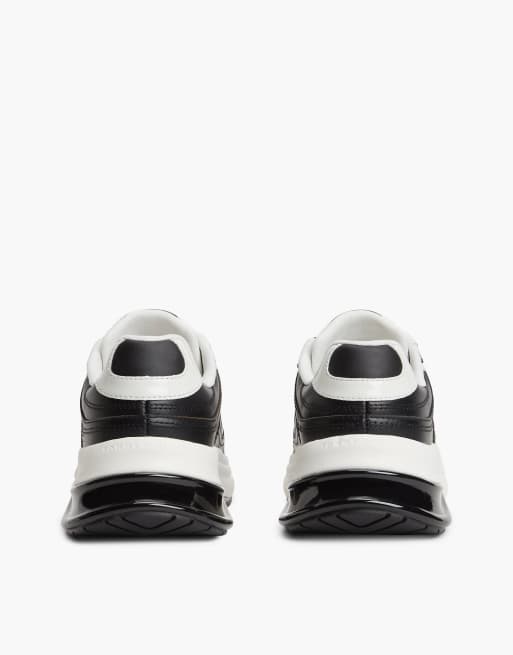 Tommy Hilfiger Th monogram leather chunky trainers in black, 4 of 7