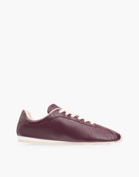 Tommy Hilfiger Th monogram low profile leather trainers in dark purple - view 1