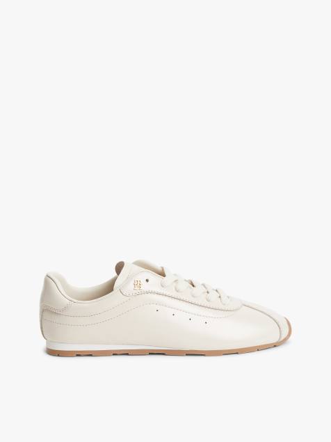 Tommy Hilfiger Th monogram plaque leather trainers in beige - view 1