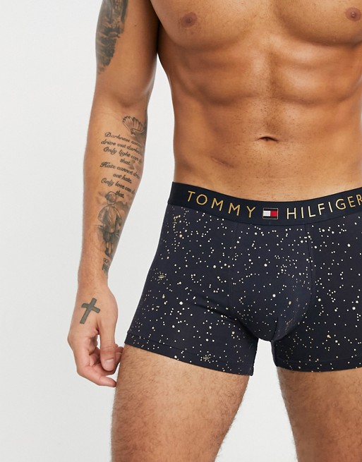 Tommy Hilfiger trunk in navy with gold splatter and gold logo waistband