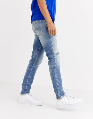tapered distressed jeans