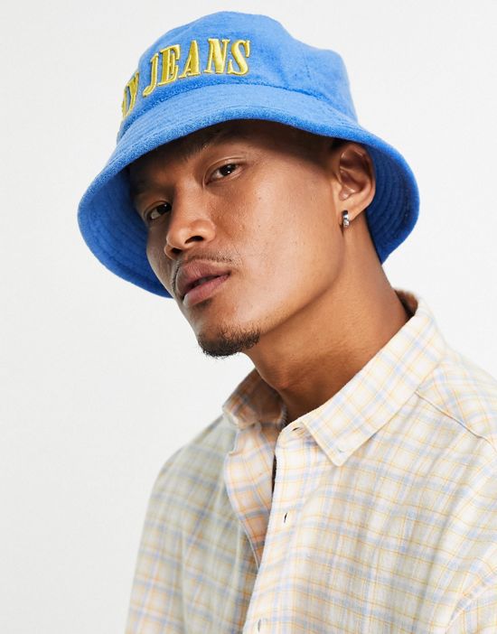 https://images.asos-media.com/products/tommy-jeans-acid-towelling-bucket-hat-in-blue/202956321-4?$n_550w$&wid=550&fit=constrain