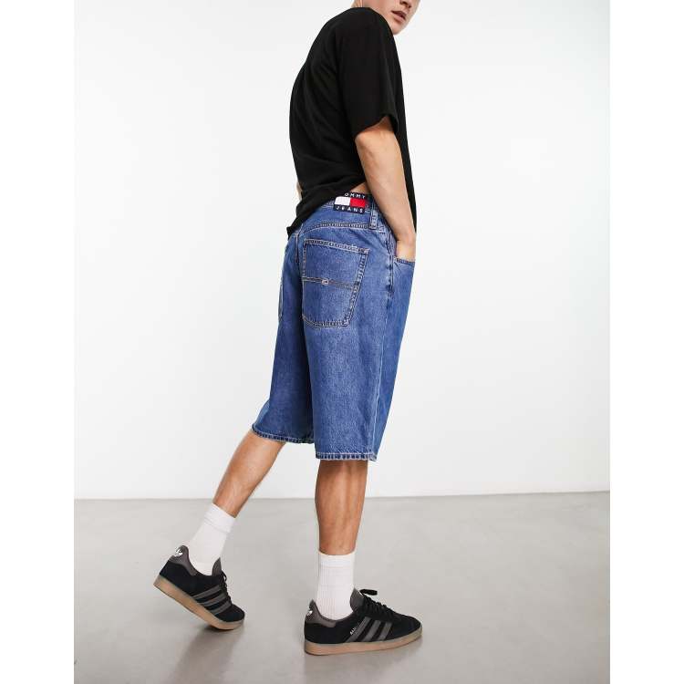 Ik heb een Engelse les Zeeanemoon Vertrouwen op Tommy Jeans Aiden baggy denim shorts in mid wash blue | ASOS