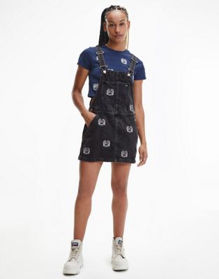Tommy Jeans all over critter dungaree dress in black  - ASOS Price Checker