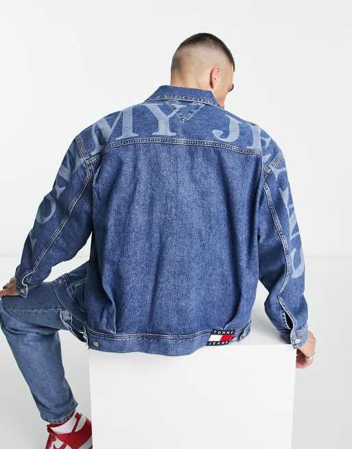 Tommy Jeans arm logo oversized denim trucker jacket in mid wash