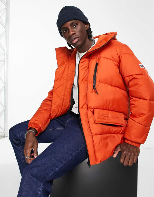 Tommy Jeans asymmetric zip hooded puffer jacket in orange ASOS