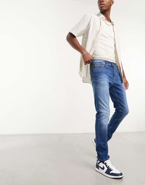 Tommy Jeans – Austin – Mellanblå avsmalnande jeans med smal passform - view 1