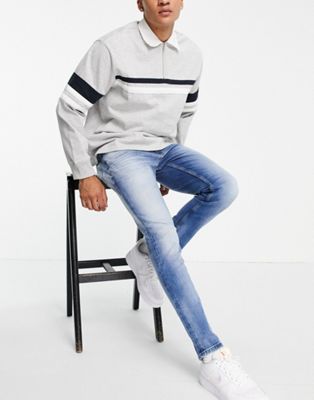 Tommy Jeans Austin slim fit jeans in light blue - ASOS Price Checker