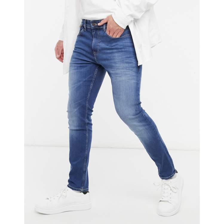 Tommy Jeans austin slim tapered jeans in mid wash