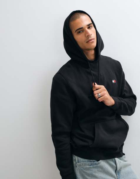 Tommy Jeans badge logo hoodie in black - view 1