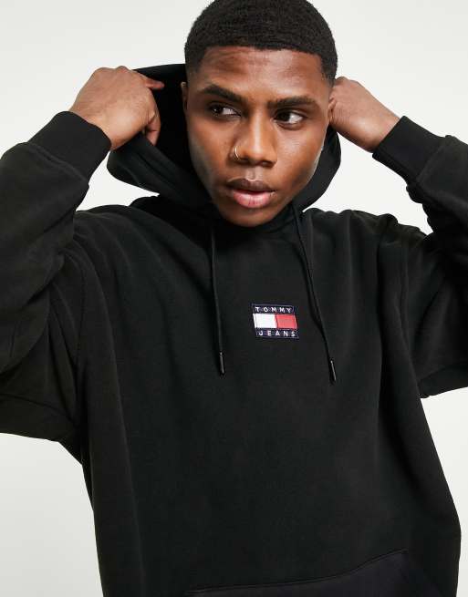 Tommy Jeans badge polar fleece hoodie relaxed fit in black