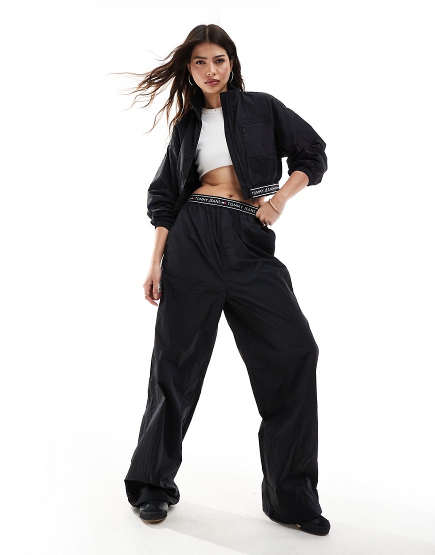 Tommy Jeans baggy taping trackpants in black