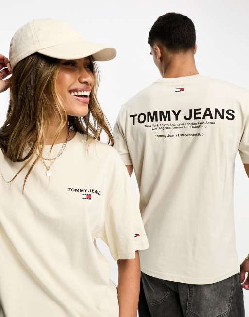 Tommy Jeans – Beige, klassisk t-shirt i unisex-modell med guldfärgad, linjär logga