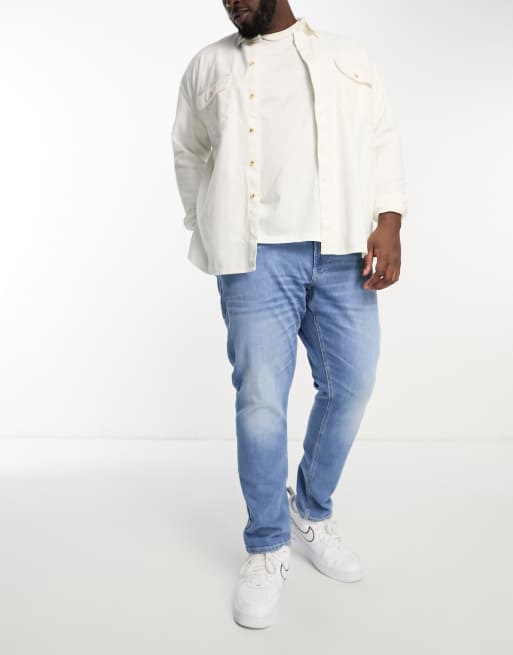 Tommy Jeans Big & Tall – Scanton – Eng geschnittene Jeans in mittelblauer Waschung
