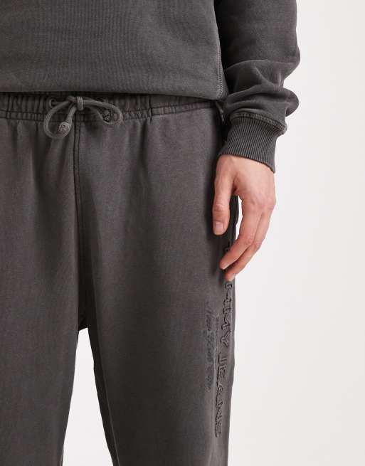 Tommy Jeans – Bleksvarta, avslappnade mjukisbyxor med logga, 5 av 5
