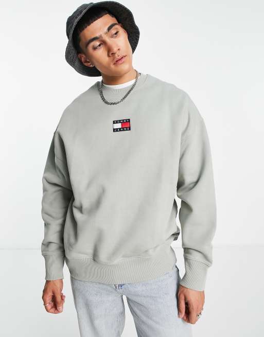 Tommy Jeans central flag badge sweatshirt relaxed fit in green | ASOS