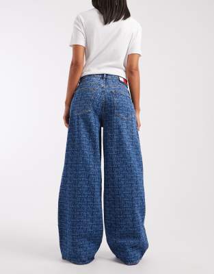 Tommy Jeans Charlie Loose Jeans With All Over Logo Print In Blue