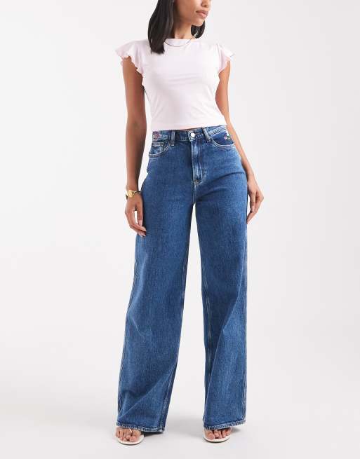 Tommy Jeans – Claire – Niebieskie jeansy z szerokimi nogawkami, podwyższonym stanem i haftowanym wzorem w kwiaty